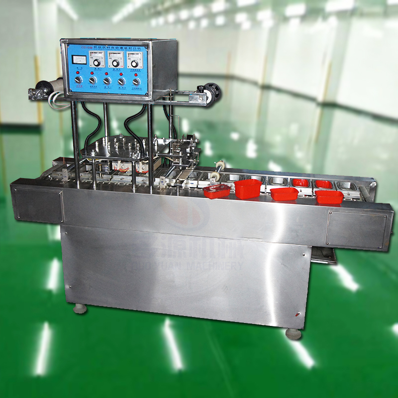 豆瓣酱封口机,塑盒装酱料包装机